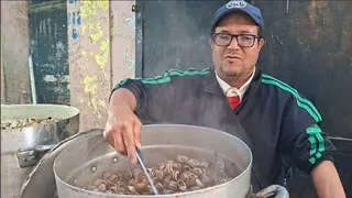 الحلزون  ،طبق شعبي يُعطّر  سوق  الاوراس بوهران