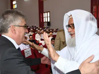 إحياء اليوم الوطني للإمام بغليزان: إشادة بدور الإمام ومشاريع لترميم الصروح الدينية